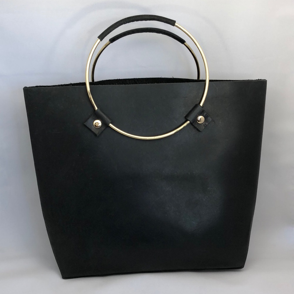 Tribe Alive brass handle handbag